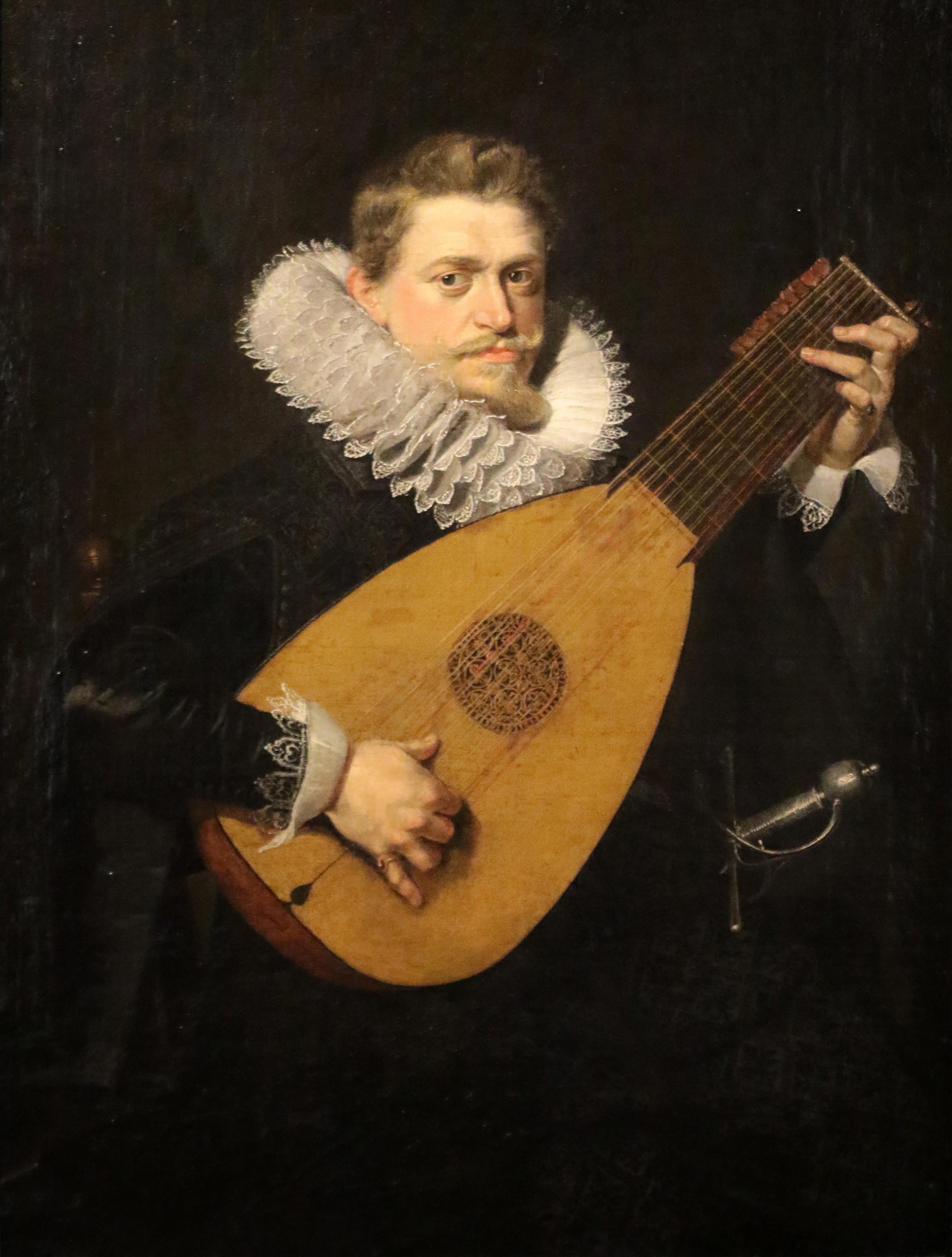 Portrait by Peter Paul Rubens of lute player using thumb-over hand position